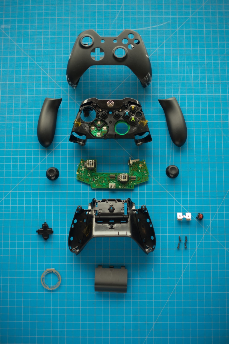 pattern, grid, tiled floor, xbox, indoors, controller, disassembled, remote, communication, high angle view, still life, 5K, device, human representation