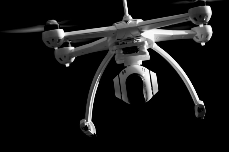 white, camera, equipment, flying machine, wheel, model, black background, pedal, toys, electronic, black and white, toy, 5K, propeller, quadrocopter, quadcopter