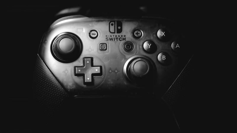black background, no people, control panel, leather, dark, controller, detail, gearshift, close-up, air vehicle, black, airplane, car, grayscale, mode of transportation