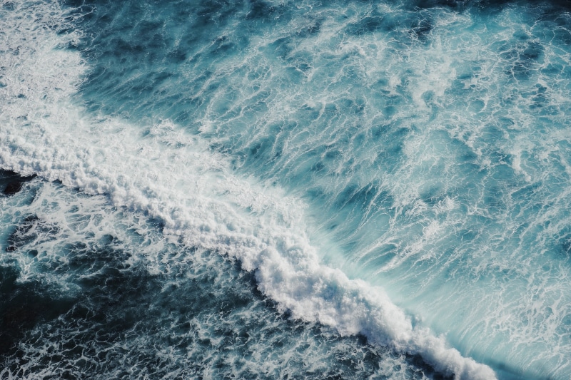 power in nature, high angle view, waterfront, turquoise colored, water, scenics, sea, motion, liquid, water Surface, backgrounds, wake - water, splashing