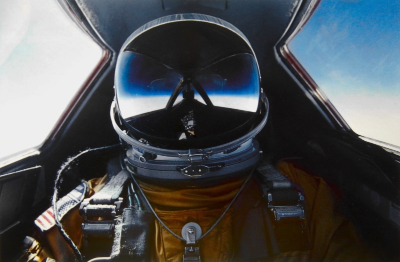 uniform, aircraft, one person, mode of transportation, outdoors, reflection, cockpit, Pilot, portrait, 2K, day, sea, close-up, travel, nature, Flight Suits