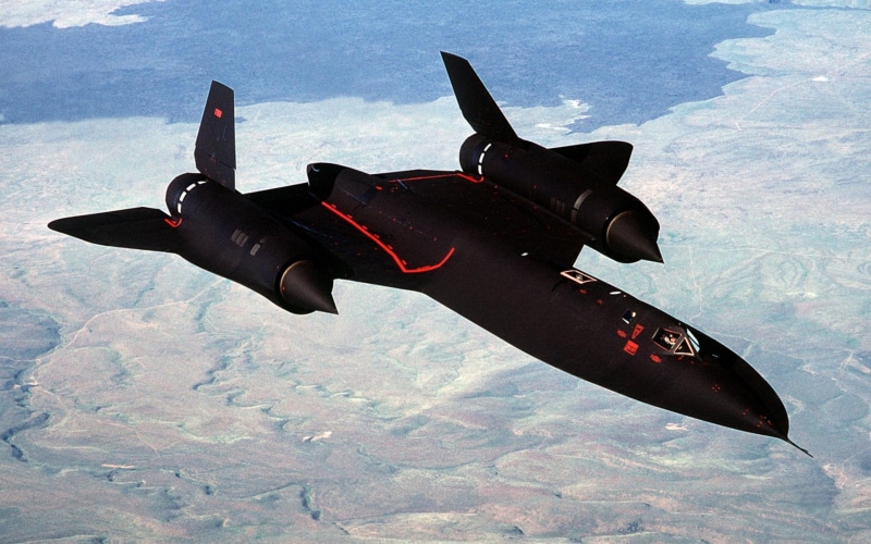 day, flying, sky, sea, water, air force, mode of transportation, single object, explosive, military airplane, fighter plane, no people, lockheed sr 71 blackbird