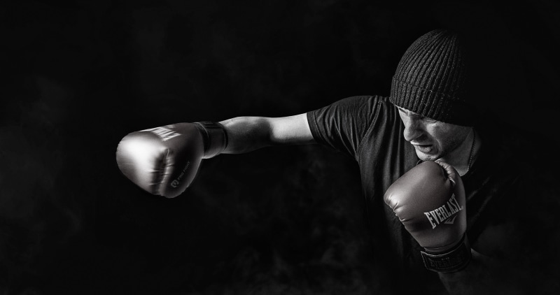 fist, indoors, 4K, bonnet, boxer, combat sport, black-and-white, male, motion, conflict, training, force, fighter, punching, human body part, fighting