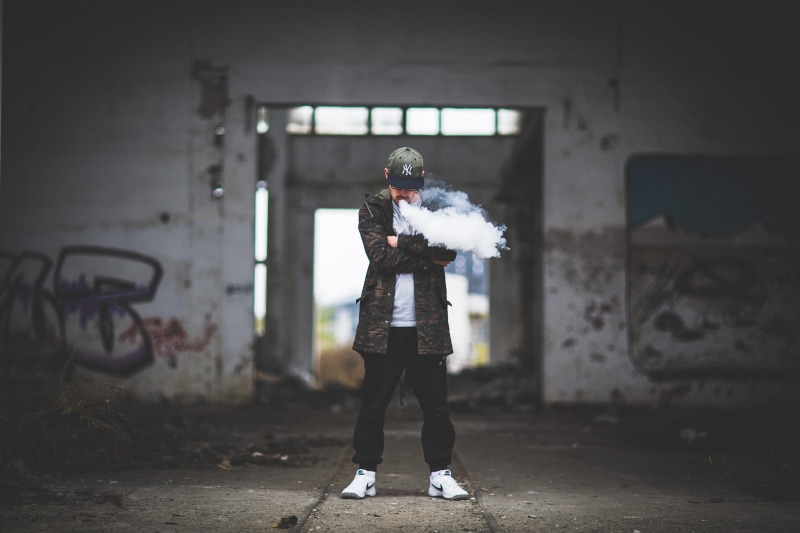 snapback, smoke - physical structure, kyiv, vape, one person, real people, ukraine, 2K, standing, adult, abandoned building, front view, man, abandoned