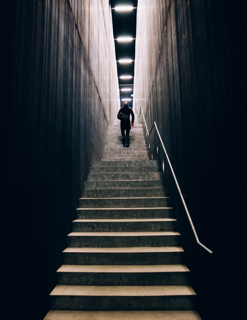 pants, horror, built structure, illuminated, architecture, the way forward, black, stairs, steps and staircases, going, full length, people, light at the end of the tunnel