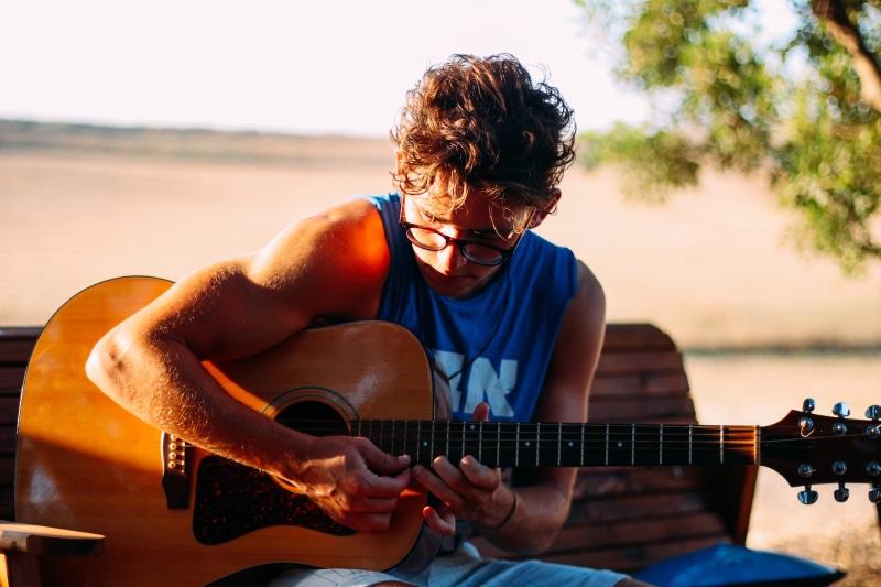 men, song, classic, instrument, man, keyboard, skill, boy, leisure activity, concert, music, hand, outdoors, young, entertainment, sitting, studio, guitar
