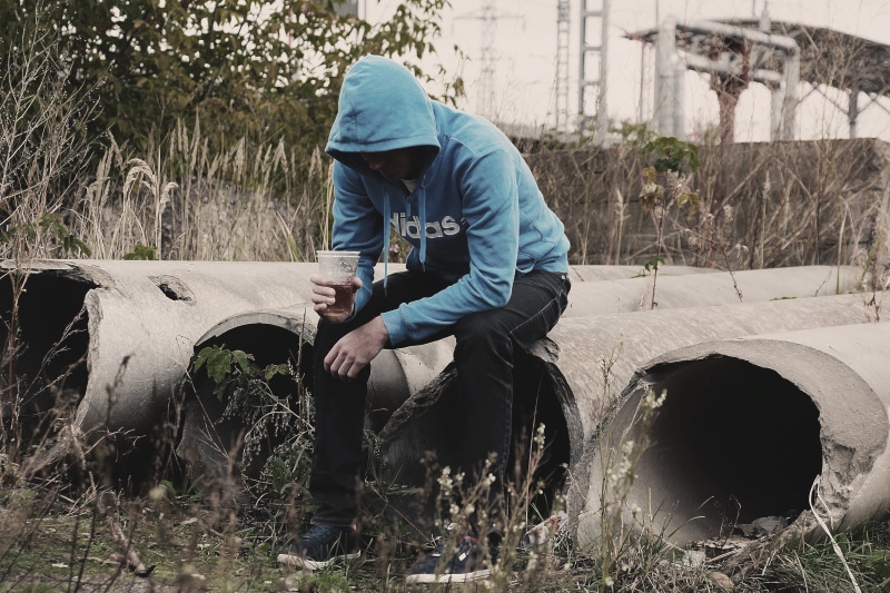 loneliness, one Person, hoodie, gray, mode of transportation, three quarter length, dirty, disposable cup, transportation, casual clothing, pullover, farmer