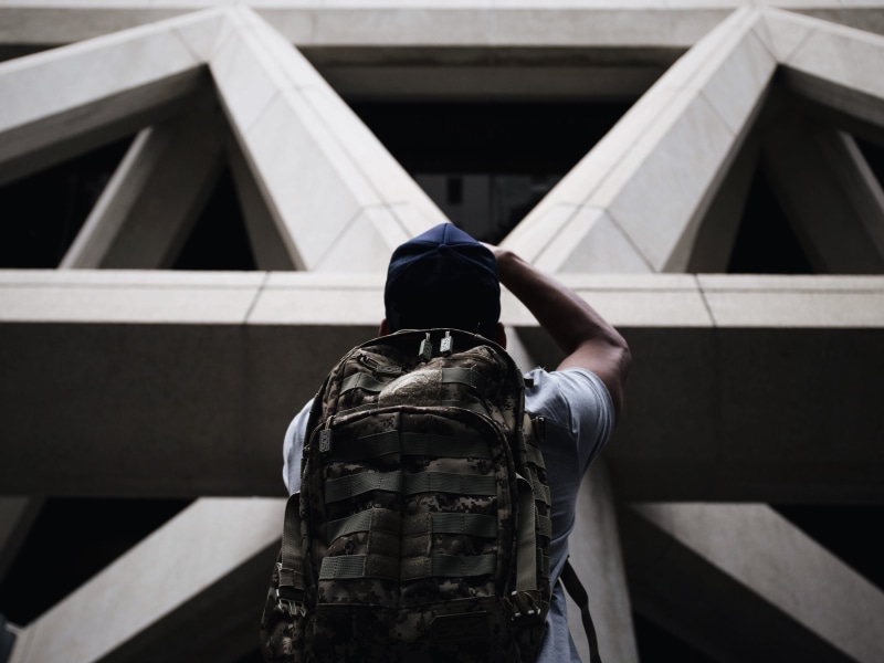 street, white, men, structure, front, wearing, hand, occupation, shirt, standing, building exterior, lifestyles, 4K, urban, t shirt, daytime, rear view