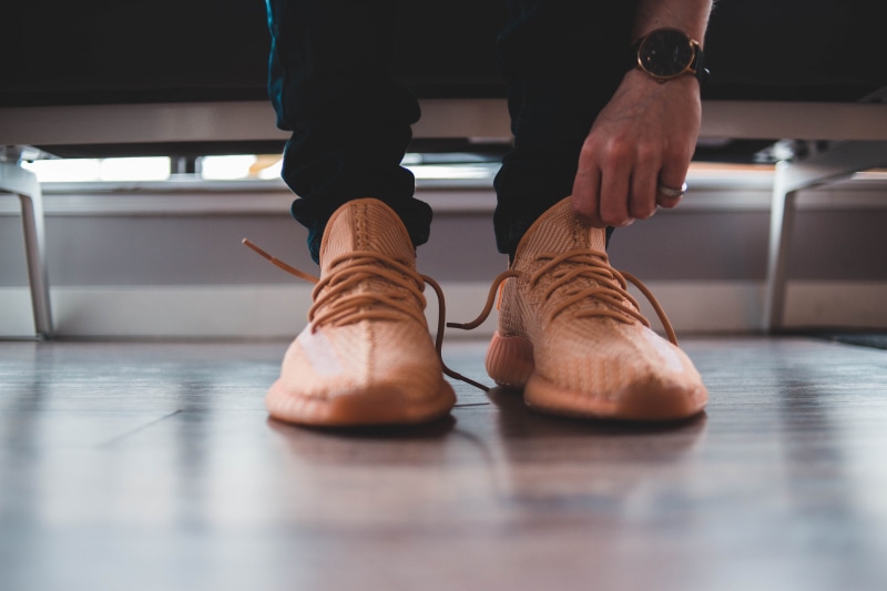 standing, day, real people, hardwood, human leg, bridge, human limb, boot, human foot, man, clothing, low section, relaxation, grey, tiled floor, sitting