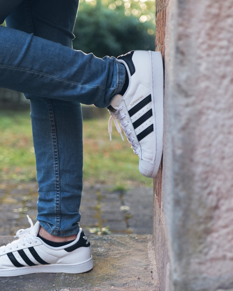 human body part, women, superstar, human foot, denim, grey, leisure activity, low section, nature, white, clothing, cowboy boot, shoe, men, human, human limb
