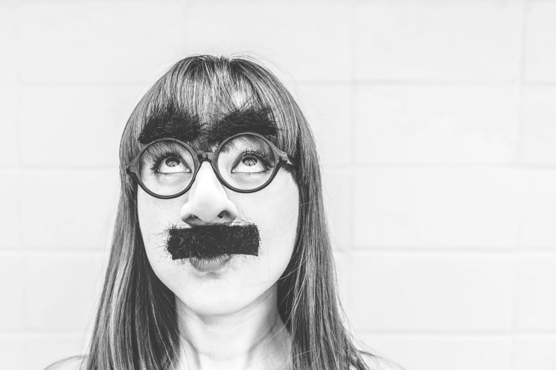 scale, indoors, black, close-up, lazy, costume, goofy, wearing, young adult, only women, looking at camera, beautiful woman, adult, mustache, body part