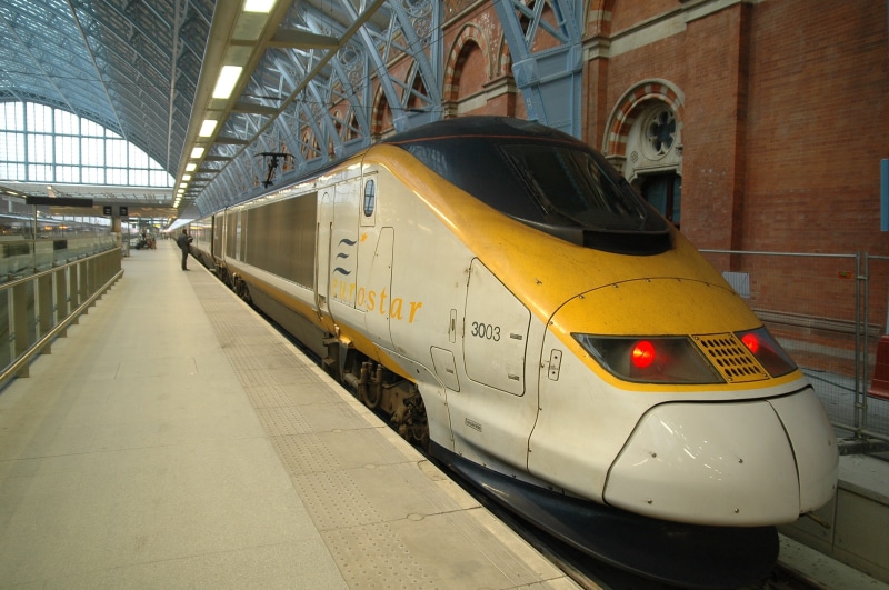 mode of transport, train, 2K, kings cross station, Eurostar, railroad station, day, outdoors, transportation, person, architecture, airplane, United Kingdom