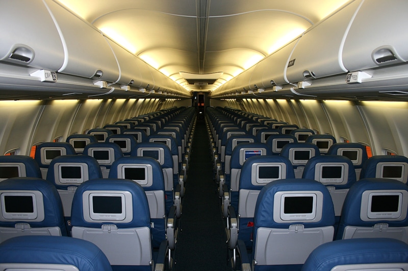 lighting, storage space, modern, aircraft, airplane, seats, seat, vehicle interior, transportation, blue, mode of transportation, plane, air vehicle, luggage compartments