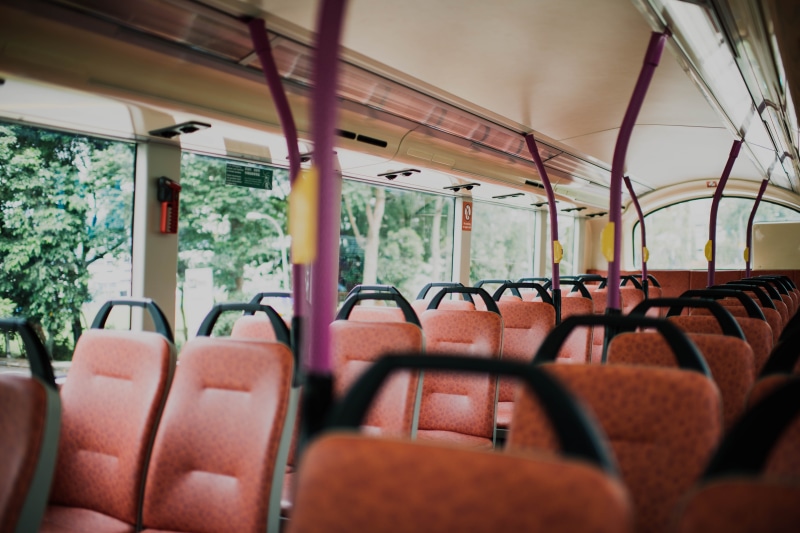 empty, public transportation, chair, inside, urban, bus, room, travel, vehicle, public transport, furniture, vehicle seat, train, transportation, potted plant