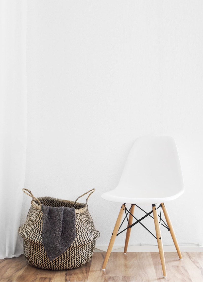 beside, copy space, wall - building feature, still life, textile, craft, white color, furniture, home interior, wooden floor, indoor, blanket, clothes