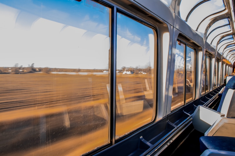 vehicle interior, architecture, station, sky, railway, fast, reflection, window, mode of transportation, glass - material, transportation system, no people