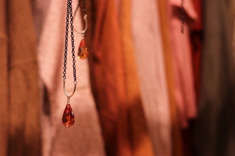 religion, outdoors, personal accessory, 5K, hand, hanging, fashion, medallion, spirituality, red, chain, background, necklace, belief, day, selective focus