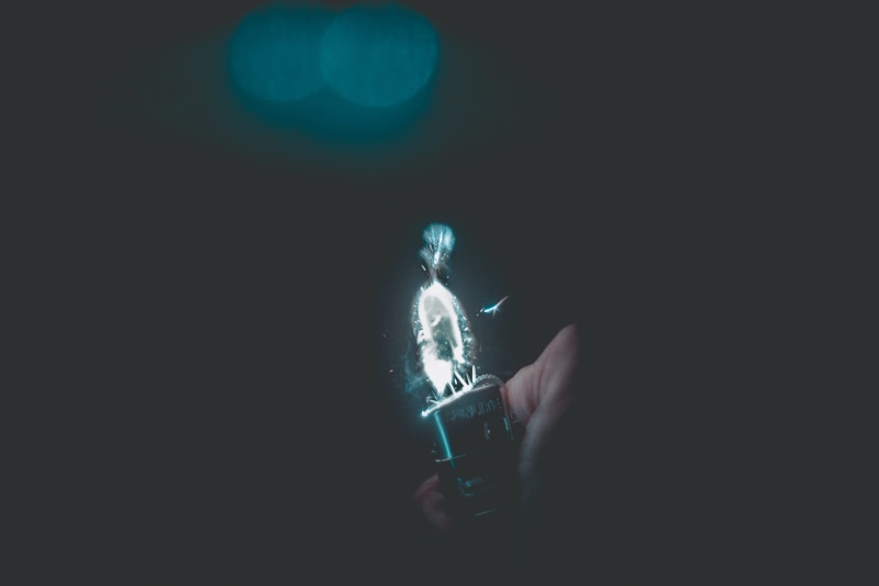 gun, lighter, dark, person, fire and ice, ice, fire, young adult, teal, adult, led, black background, technology, lighted, spark, aesthetic, hand, swimming