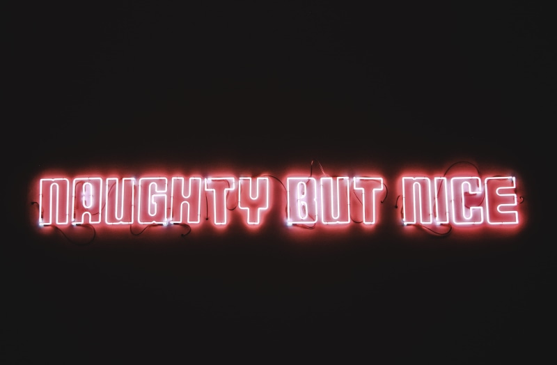 flare, naughty, western script, close-up, neon, technology, no people, laser, white board, trumpet, capital letter, light fixture, lightbulb, light, ceiling light