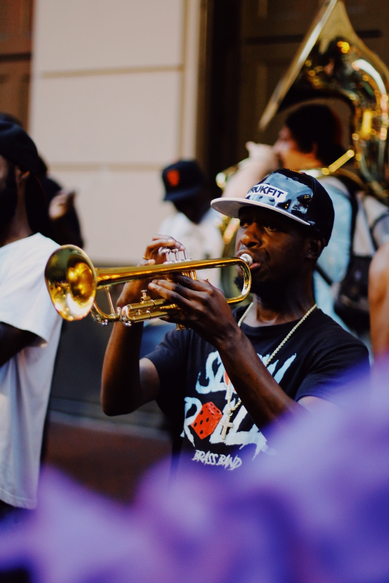hat, brass instrument, arts culture and entertainment, musical instrument, group of people, men, skill, photography, artist, brass, helmet, cornet, incidental people