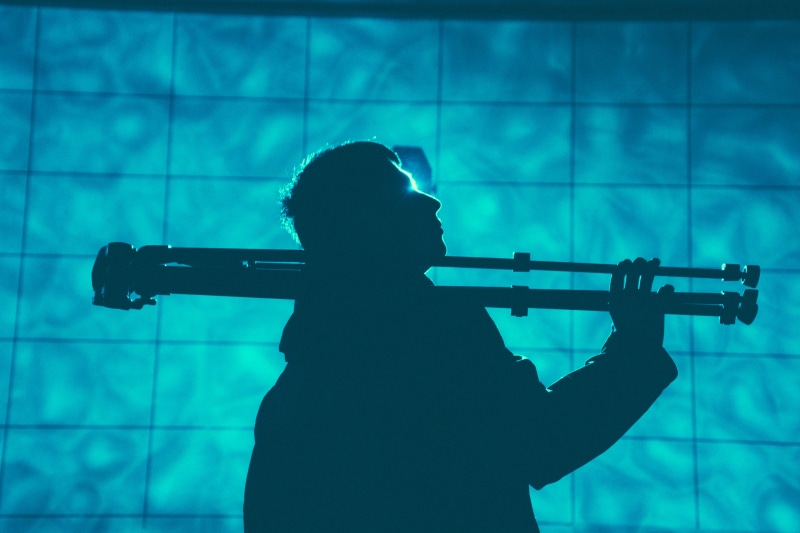 arts culture and entertainment, men, light, photo, brass section, indoors, musician, black, waist up, duel, nightlife, leisure activity, stage, skill, tripod
