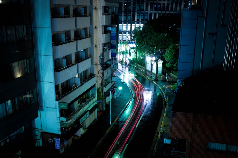 along, building, built Structure, blurred Motion, illuminated, dark, cityscape, speed, rail transportation, downtown District, street, time lapse photography