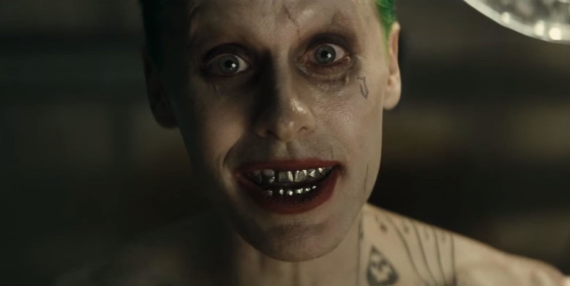 focus on foreground, human body part, front view, one person, body part, mouth open, headshot, Jared Leto, horror, spooky, indoors, 1080P, Joker, portrait