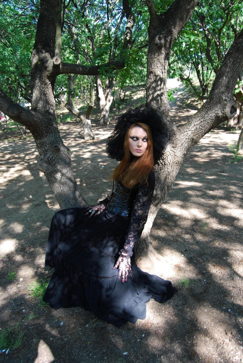 sitting, sleeved, one person, real people, lifestyles, leisure activity, nature, long hair, the model, gown, fineart, looking at camera, day, casual clothing