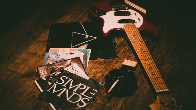 retro, no people, wood - material, string instrument, musical instrument, text, arts culture and entertainment, old-school, red, matches, 80s, string, acoustic guitar