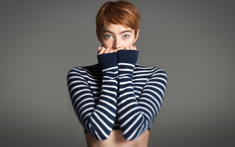 unrecognizable person, standing, Emma Stone, redhead, one person, headshot, looking at camera, obscured face, adult, women, studio shot, casual clothing