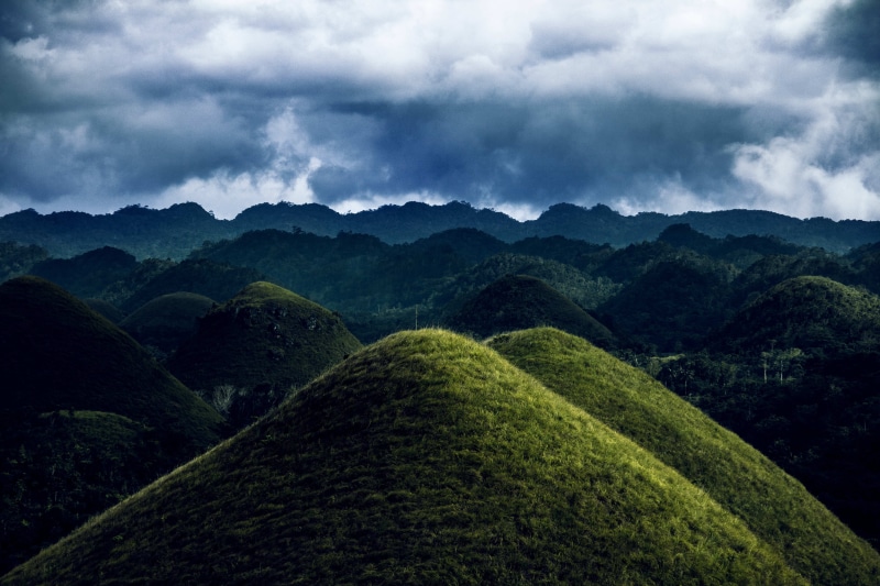 chocolate hills, hills, agriculture, no people, peak, scenery, tranquil scene, mound, non-urban scene, tea crop, weather, plateau, chocolate, philippines