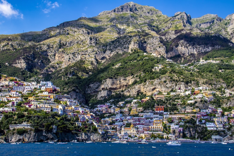 ocean, urban, tree, resort, building, mountain, city, building exterior, sky, nature, scenery, cliff, 5K, outdoors, no people, positano, cityscape, landscape