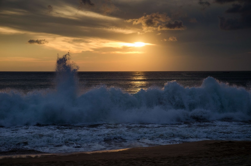 hitting, ocean, sky, water, sport, wave, power in nature, beach, nature, jimbaran, splashing, motion, horizon, beauty in nature, sunset, power, bali, indonesia