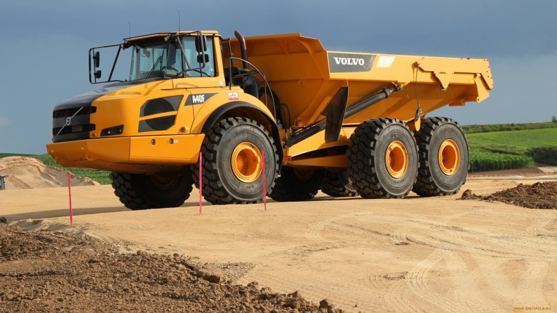 equipment, construction vehicle, Volvo A40F, vehicle, wheel, road construction, construction vehicles, mode of transportation, road, bulldozer, yellow