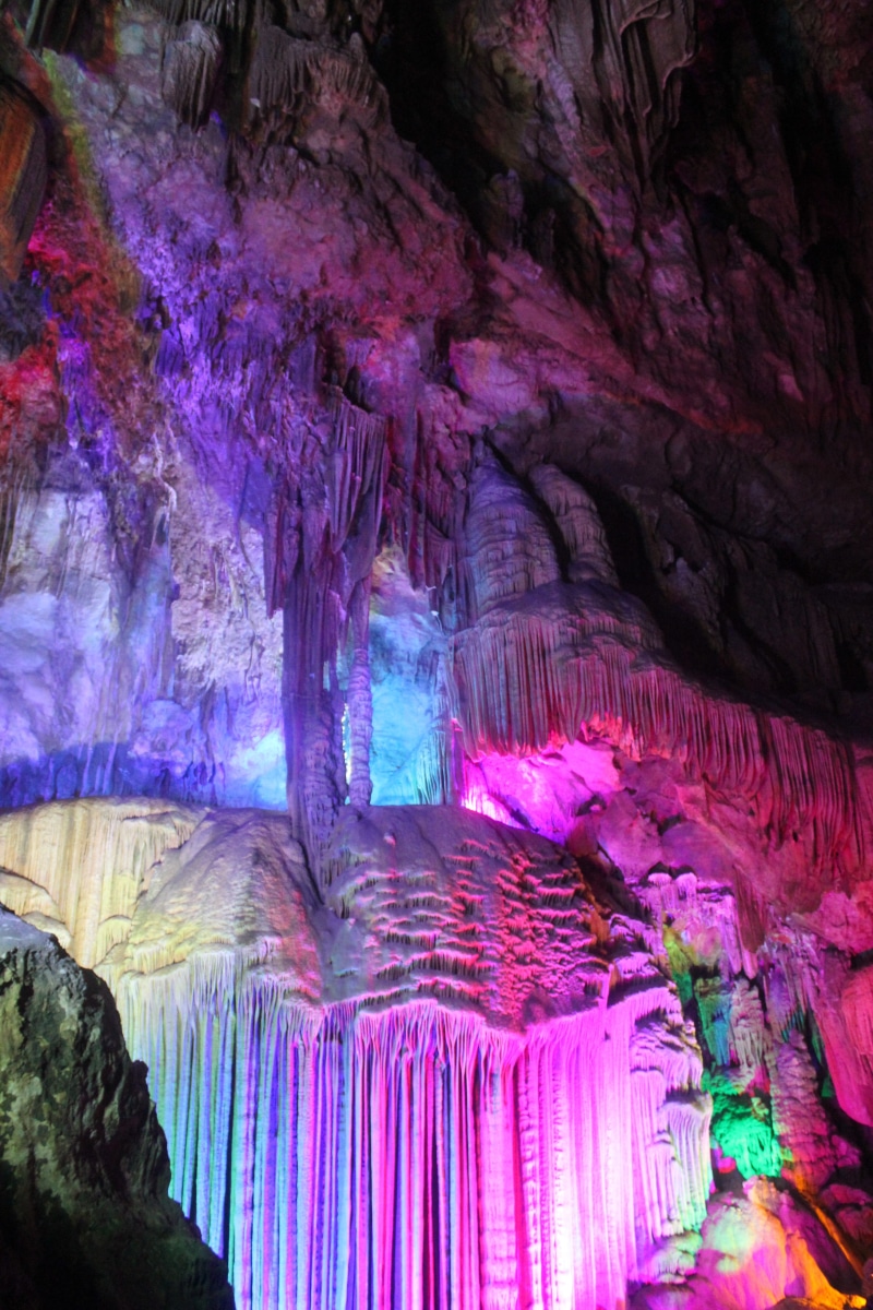 rock - object, multi colored, stalactite, pattern, cave, rainbow, geology, no people, illuminated, rock, colors, karst cave, solid, eroded, rock formation