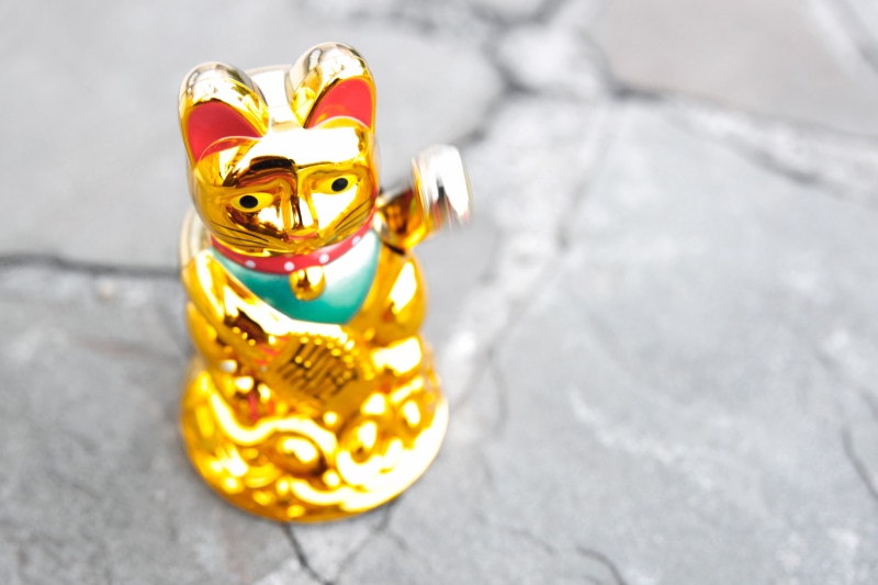 single object, multi colored, ornate, chinese, manekineko, figurine, wave, luck, no people, art and craft, creativity, china, gold colored, close-up, lucky charm