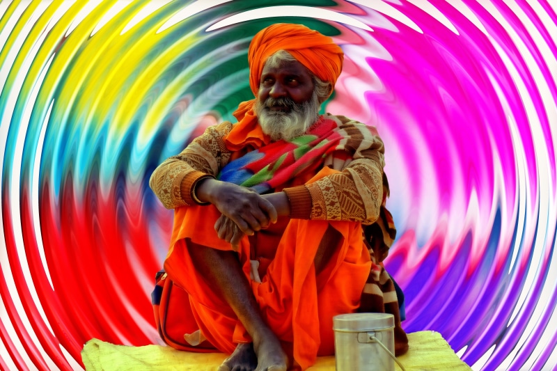 looking at camera, travel, hdr, multi colored, person, spirituality, portrait, males, stage, indoors, religion, holy, holding, real people, culture, man