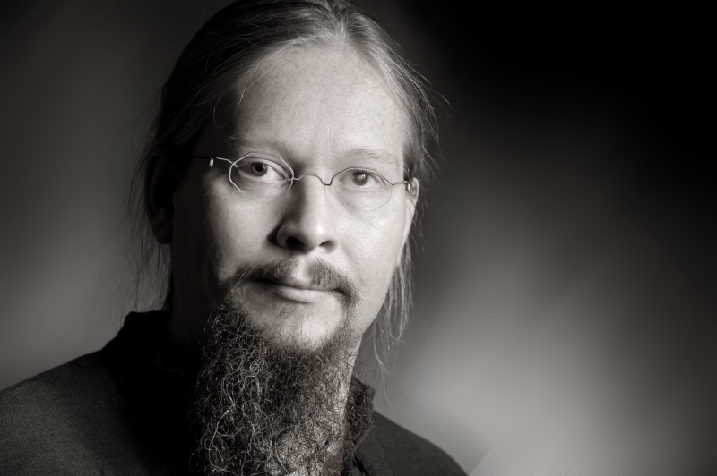serious, studio shot, indoors, beautiful people, black background, glasses, hairstyle, mustache, meditation, rest, mature men, guru, eyeglasses, close-up