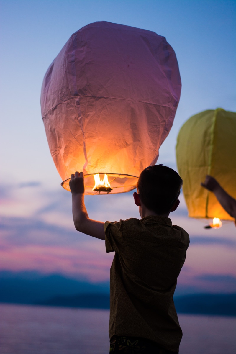 leisure activity, standing, men, festival, outdoors, burning, floating, holding, sunset, latern, fire, dusk, one person, women, person, nature, 5K, boy