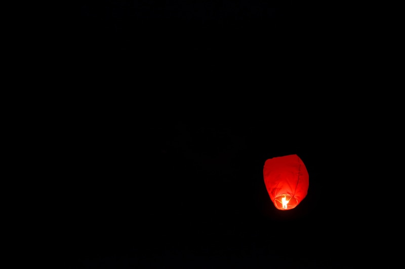 lamp, fire - Natural Phenomenon, single object, chinese new year, float, outdoors, illuminated, burning, flame, sky, lighting Equipment, glowing, traditional
