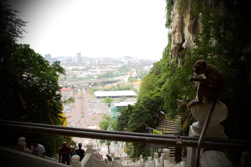 women, side view, kl, lifestyles, 5K, sitting, cityscape, nature, asia, architecture, malaysia, city, real people, building exterior, adult, batu caves