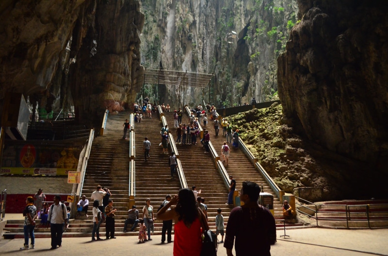 rock formation, rock, men, malay, solid, group of people, day, architecture, tourism, leisure activity, kuala lumpur, temple, built structure, rock - object