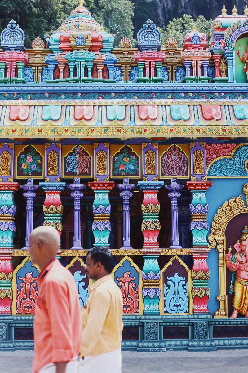 real people, men, ornate, batu caves, belief, architecture, detail, tour, art and craft, worship, kuala lumpur, lifestyles, temple, person, building exterior