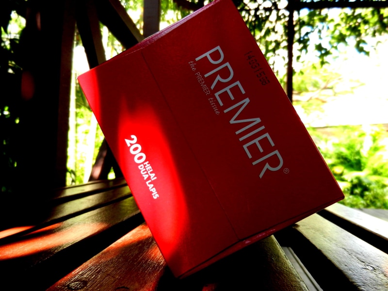 tissue box, no people, indoors, wood - material, message, tree, script, bench, sunlight, close-up, sign, focus on foreground, weird, capital letter, text