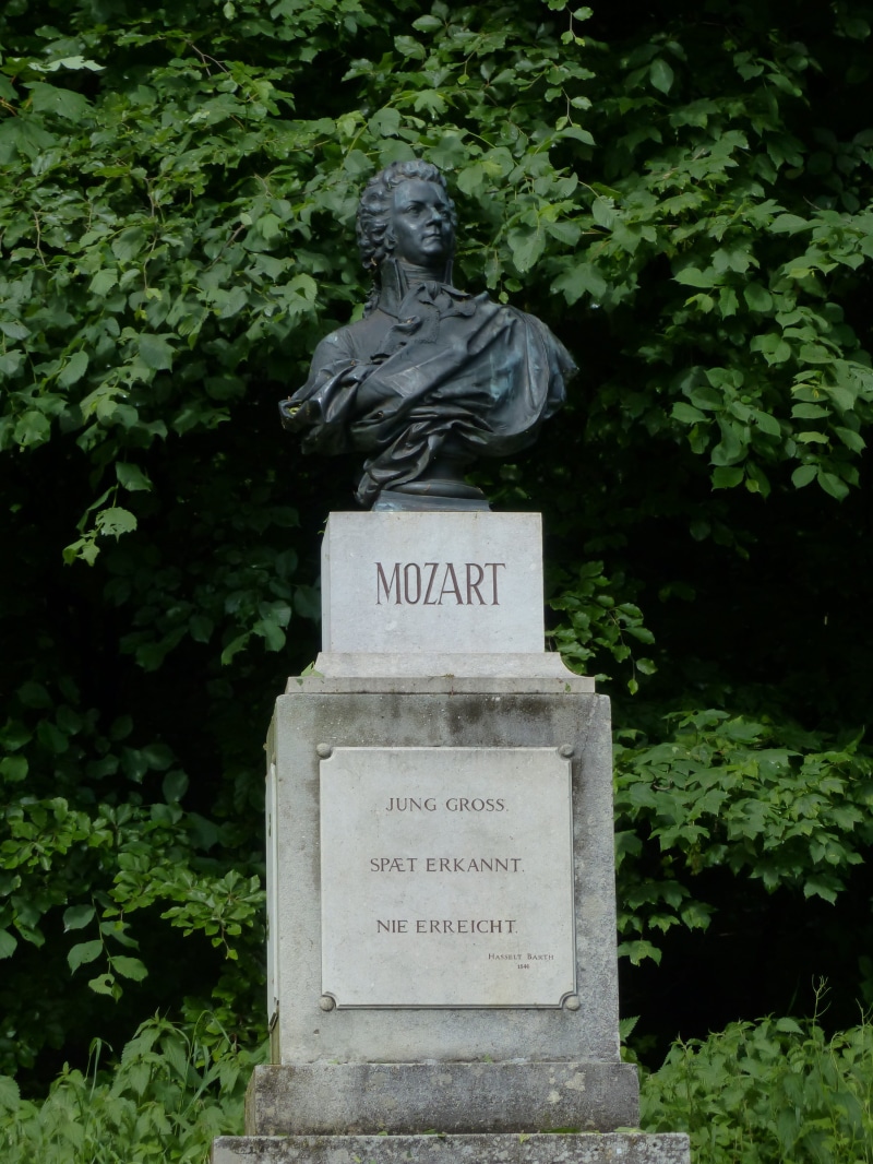 statue, no people, grave, tree, plant, wolfgang, mozart memorial, representation, nature, the past, history, male likeness, craft, day, bronze statue, stone