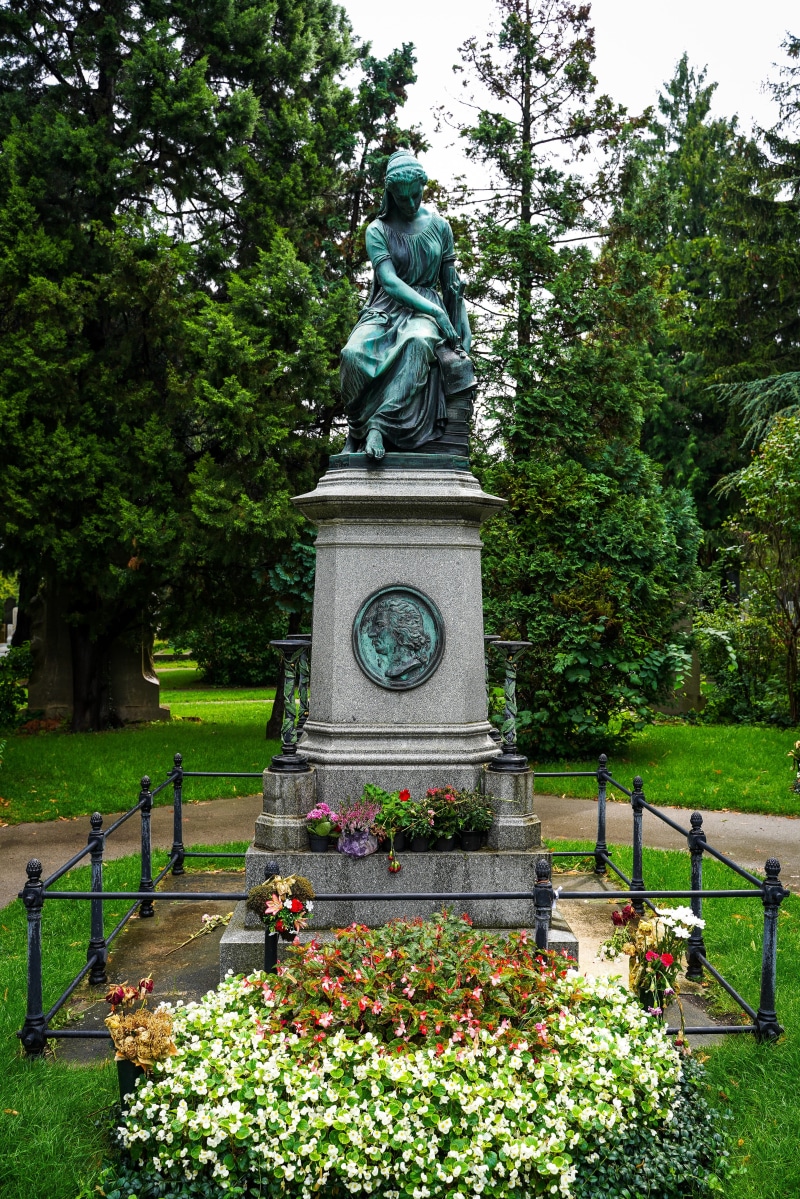 viennas central cemetery, resting place, mozart, sculpture, human representation, flower, flowering plant, vienna, angel, green color, artwork, atmospheric