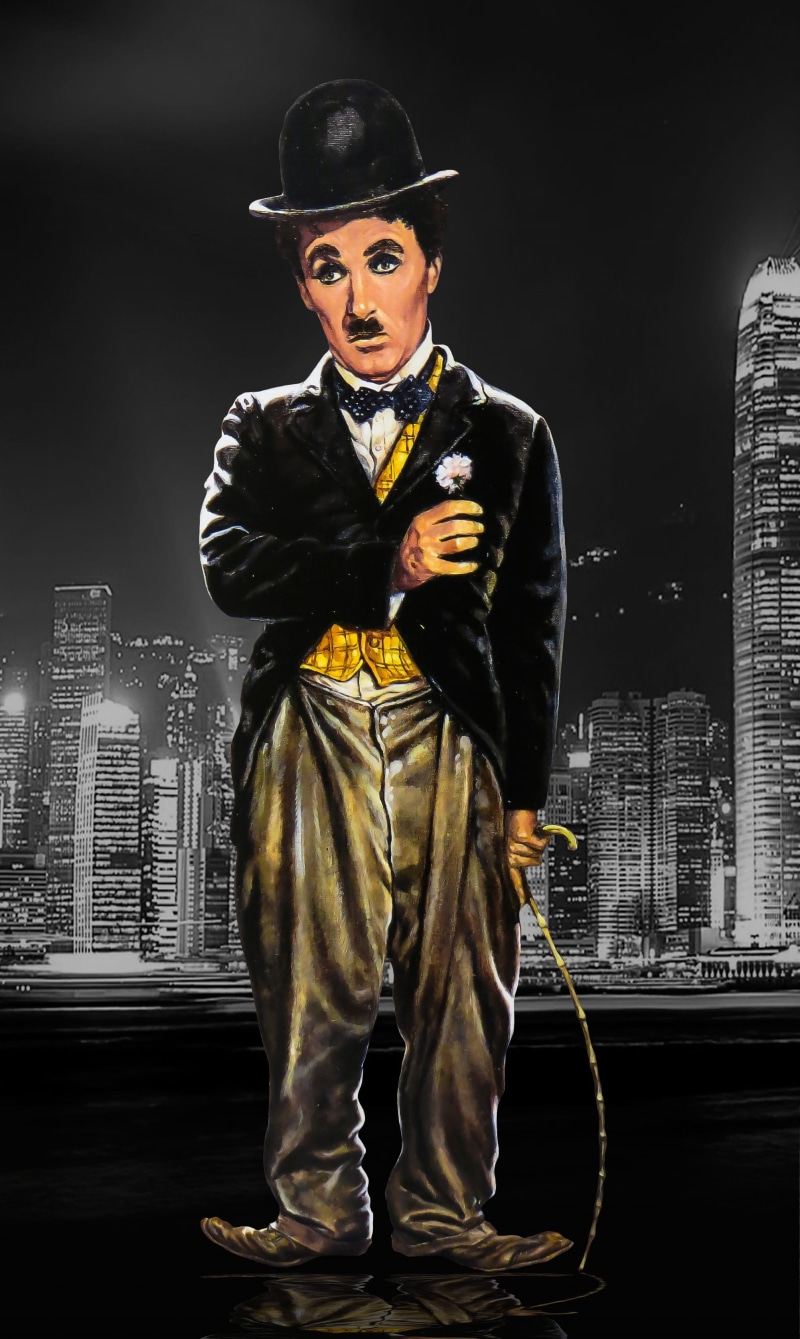 portrait, comedy, comedian, outdoors, painting, building, clothing, building exterior, built structure, front view, young men, chaplin, cityscape, charlie