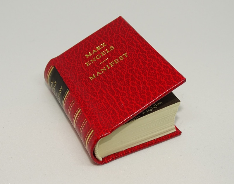 man made, manifest, man made object, friedrich engels, publication, communism, white background, no people, wisdom, office supply, policy, business, still life