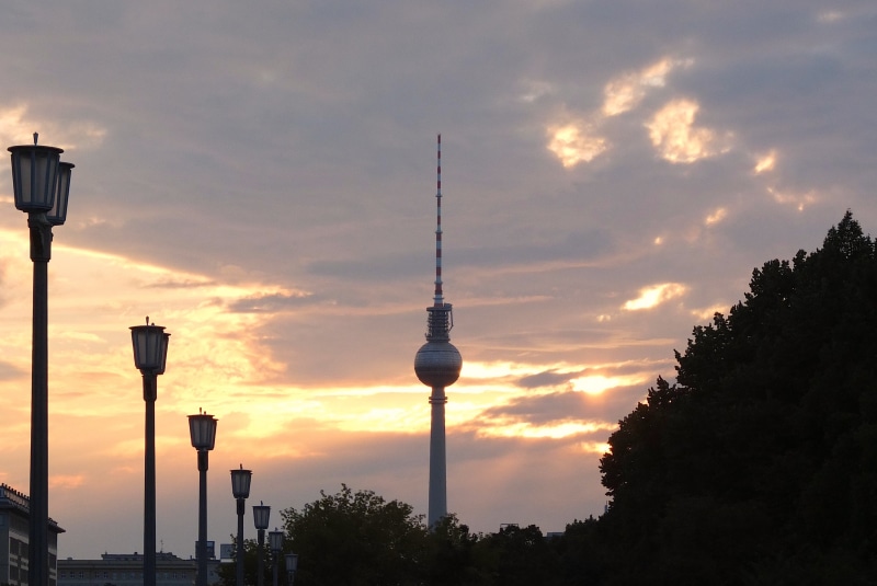 sky, sun, silhouette, architecture, tower, 2K, tv tower, plant, tree, communication, lantern, evening, built structure, no people, street lamp, spire