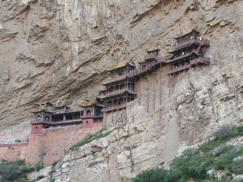 day, built structure, xuankong si, outdoors, shanxi province, weathered, datong, confucius, china, solid, no people, stone material, building, nature, residential district